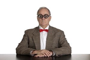 Old white man in tweed and bottle spectacles